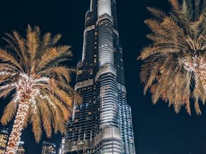 Preview wallpaper tower, building, skyscraper, architecture, palm trees