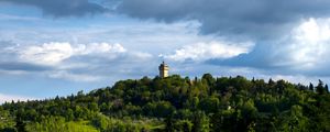 Preview wallpaper tower, building, trees, hill, nature