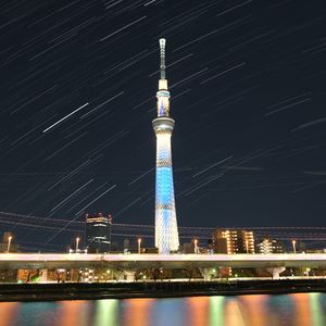 Preview wallpaper tower, buildings, architecture, night, city, long exposure