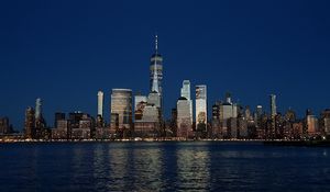 Preview wallpaper tower, buildings, architecture, sea, evening