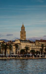 Preview wallpaper tower, buildings, architecture, palm trees, sea