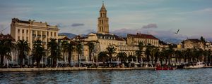 Preview wallpaper tower, buildings, architecture, palm trees, sea