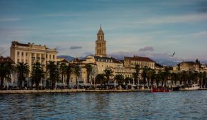 Preview wallpaper tower, buildings, architecture, palm trees, sea