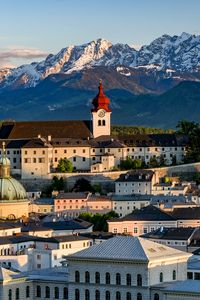 Preview wallpaper tower, buildings, architecture, roofs, houses, mountains