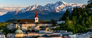 Preview wallpaper tower, buildings, architecture, roofs, houses, mountains