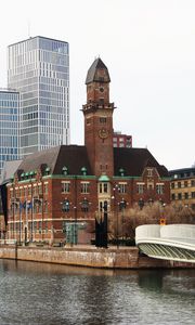 Preview wallpaper tower, buildings, architecture, embankment, river, bridge