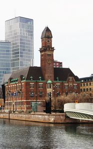 Preview wallpaper tower, buildings, architecture, embankment, river, bridge