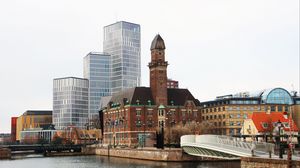 Preview wallpaper tower, buildings, architecture, embankment, river, bridge