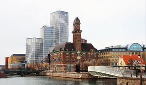 Preview wallpaper tower, buildings, architecture, embankment, river, bridge