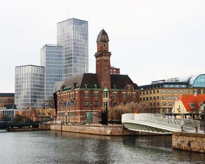 Preview wallpaper tower, buildings, architecture, embankment, river, bridge