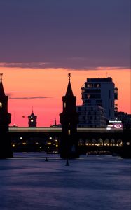 Preview wallpaper tower, buildings, bridge, river, evening
