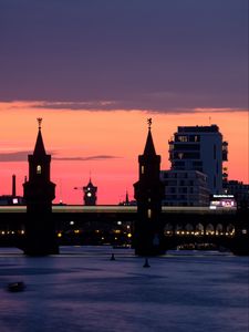 Preview wallpaper tower, buildings, bridge, river, evening