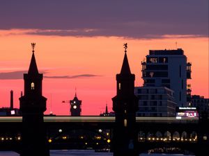 Preview wallpaper tower, buildings, bridge, river, evening