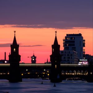 Preview wallpaper tower, buildings, bridge, river, evening