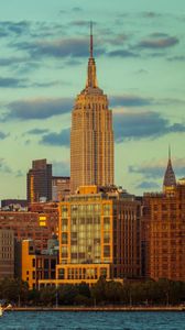 Preview wallpaper tower, buildings, clouds, nature