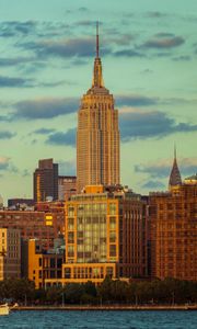 Preview wallpaper tower, buildings, clouds, nature