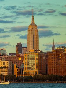 Preview wallpaper tower, buildings, clouds, nature