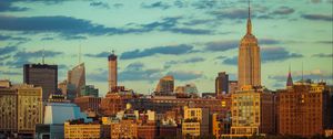 Preview wallpaper tower, buildings, clouds, nature