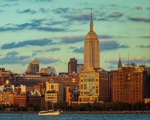 Preview wallpaper tower, buildings, clouds, nature