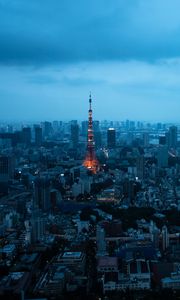 Preview wallpaper tower, buildings, houses, lights, twilight, city