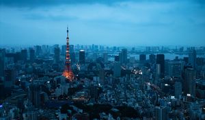 Preview wallpaper tower, buildings, houses, lights, twilight, city
