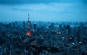 Preview wallpaper tower, buildings, houses, lights, twilight, city