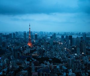 Preview wallpaper tower, buildings, houses, lights, twilight, city