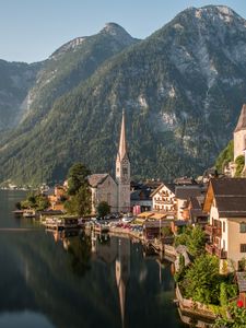 Preview wallpaper tower, buildings, houses, lake, mountains