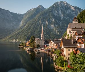 Preview wallpaper tower, buildings, houses, lake, mountains