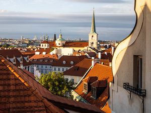 Preview wallpaper tower, buildings, houses, roofs, tiles, city