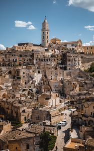 Preview wallpaper tower, buildings, houses, street, city