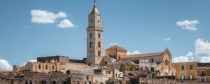 Preview wallpaper tower, buildings, houses, street, city