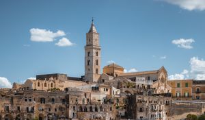 Preview wallpaper tower, buildings, houses, street, city