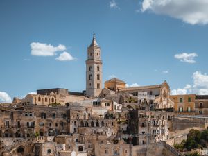 Preview wallpaper tower, buildings, houses, street, city