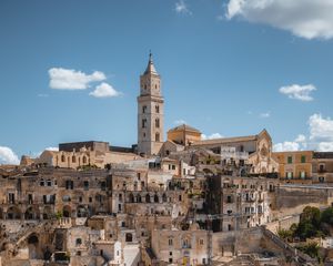 Preview wallpaper tower, buildings, houses, street, city