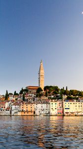 Preview wallpaper tower, buildings, houses, sea, city