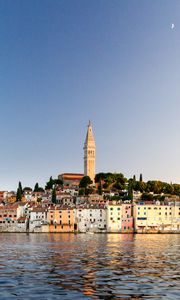 Preview wallpaper tower, buildings, houses, sea, city