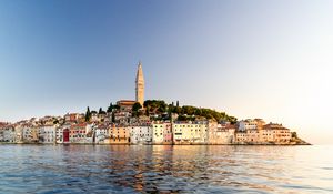 Preview wallpaper tower, buildings, houses, sea, city