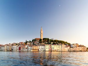 Preview wallpaper tower, buildings, houses, sea, city