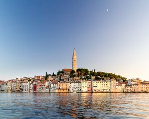 Preview wallpaper tower, buildings, houses, sea, city