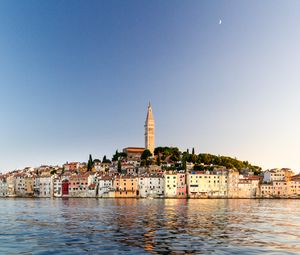 Preview wallpaper tower, buildings, houses, sea, city