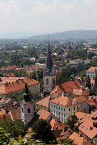 Preview wallpaper tower, buildings, houses, roofs, city, ljubljana, slovenia