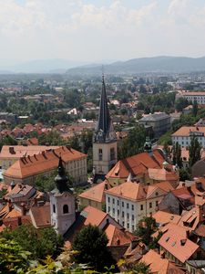 Preview wallpaper tower, buildings, houses, roofs, city, ljubljana, slovenia