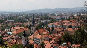 Preview wallpaper tower, buildings, houses, roofs, city, ljubljana, slovenia