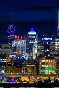 Preview wallpaper tower, buildings, lights, inscriptions, night, city