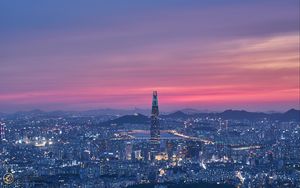 Preview wallpaper tower, buildings, lights, city, twilight
