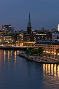 Preview wallpaper tower, buildings, lights, embankment, river, twilight, city