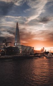 Preview wallpaper tower, buildings, river, embankment, city