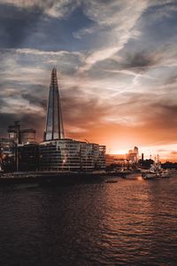 Preview wallpaper tower, buildings, river, embankment, city