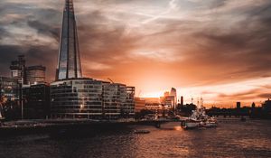 Preview wallpaper tower, buildings, river, embankment, city